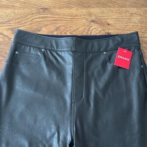 Black stretchy vegan leather pants. Spanx Large. New with tags
